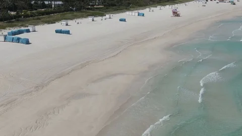 Drone Flying Over Empty South Beach Close Up During Coronavirus Lockdown Video stock 127063994