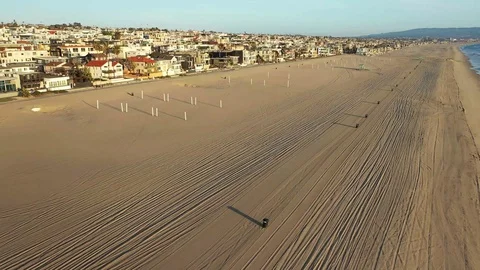 Drone flying over empty volleyball courts and beaches of CA Video stock 127610184