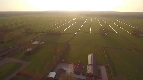 Drone flying over farm in Eemnes The Netherlands Stock Footage