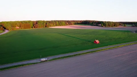 Drone flying over the field to the forest Stock Footage 276530308