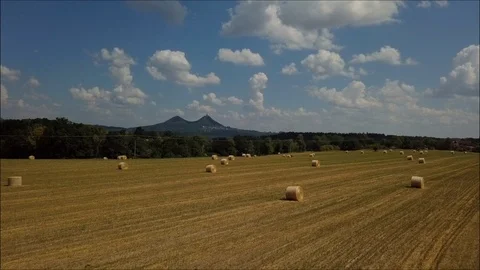 Drone flying over the field with haystacks Video stock 108650565