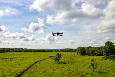 Drone flying over a Field Foto stock