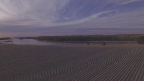 Drone Flying Over Field To River Raw Stock Footage 78876169