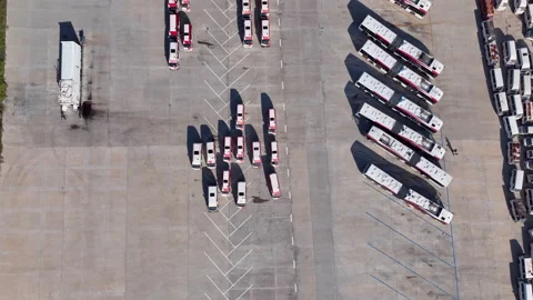 Drone flying over fleet of parked buses Stock Footage 220823973