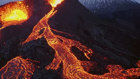 Drone flying over flowing lava in Iceland Aerial Video stock 156283965