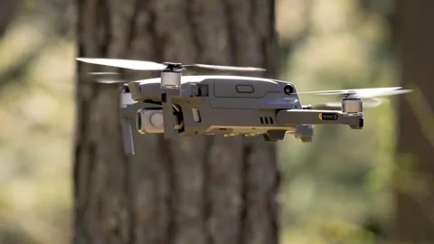 Drone Flying Over Forest with Camera Equipment Stock Footage 303458502