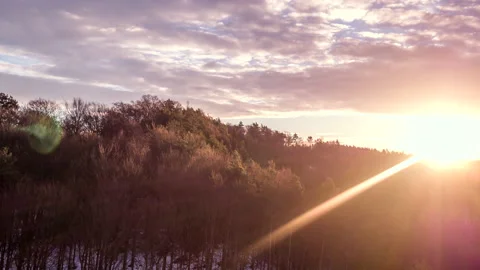 Drone flying over forest during sunset Stock Footage 147498318
