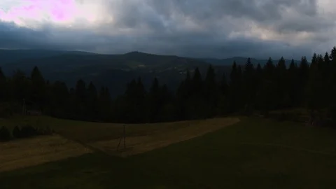 Drone flying over the forest in a mountain valley 4k HDR H264 Stock Footage 88323752