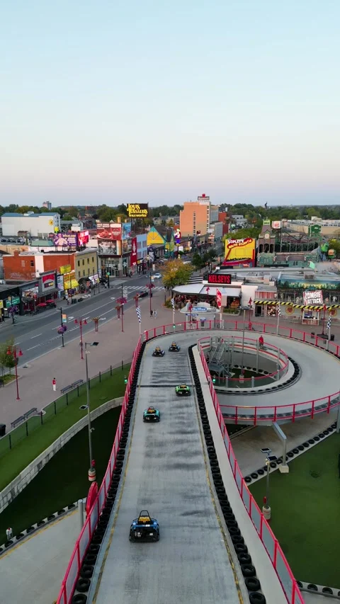 Drone Flying Over Go-Kart Racing Track at Clifton Hill Amusement Park, Niagara 스톡 동영상 330450809