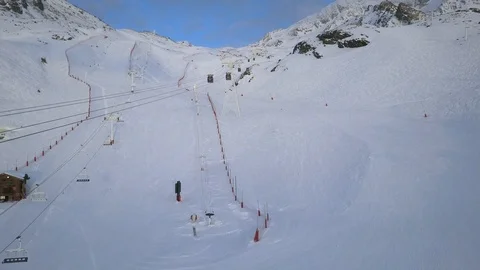 Drone Flying Over A Gondola Path Headed On The Top Of Ski Slope Stock Footage 93659959