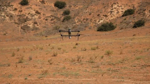 Drone flying over the hilly and desert land Video stock 99049826