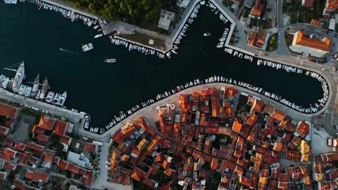 Drone flying over historic stari grad harbor on hvar island Stockbeeldmateriaal 335792543