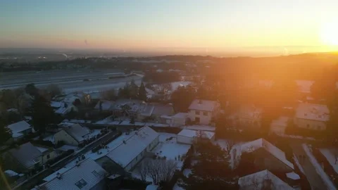 Drone flying over Houses while Sunset Stock Footage 225926883