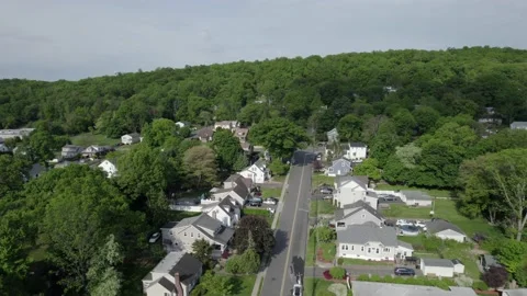 Drone flying over housing complex green trees Stock Footage 160071743