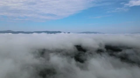 Drone flying over huge clouds Stock Footage 137966799