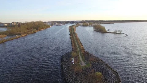 Drone flying over jetty and beautiful nature in Huizen Noord-Holland Stock Footage 75351607