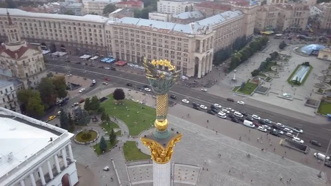Drone flying over Kiev Independence Monument in city center Stock Footage