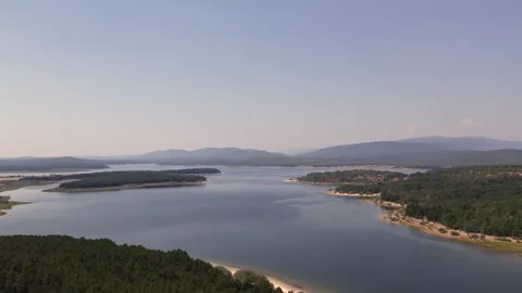Drone flying over La Cuerda del Pozo Reservoir in Soria, Spain 動画素材 342606149