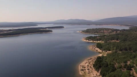 Drone flying over La Cuerda del Pozo Reservoir in Soria 動画素材 342606356