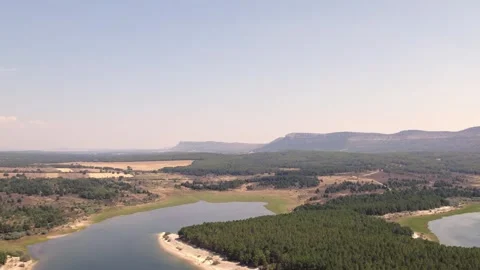 Drone flying over La Cuerda del Pozo Reservoir 動画素材 342606396