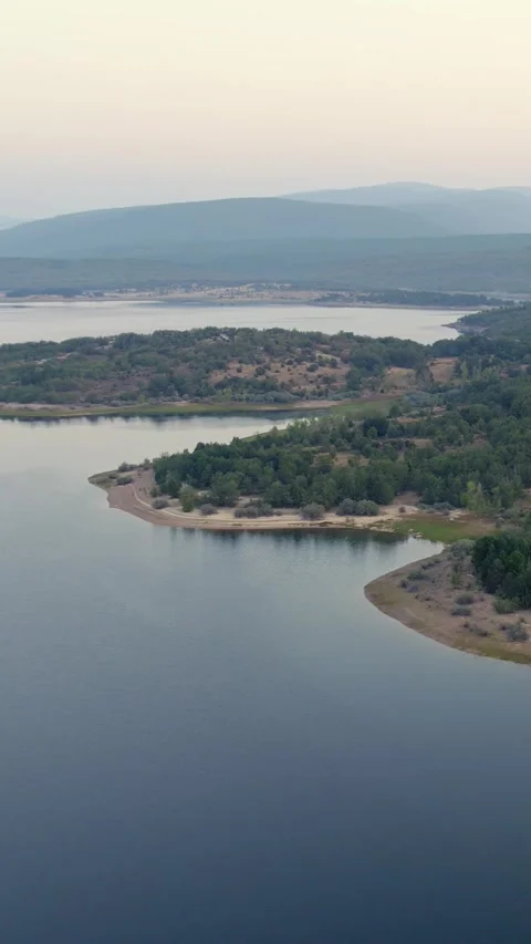 Drone flying over La Cuerda del Pozo reservoir in Soria, Spain 動画素材 342607460