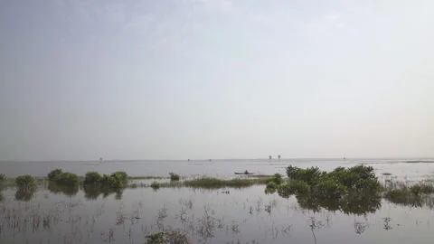 Drone flying over a lake in Cameroon, Africa Stock Footage 258652817
