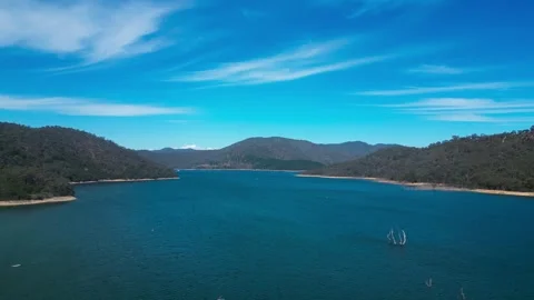 Drone flying over Lake Eildon in Victoria, Australia with blue water Stock Footage 331574438
