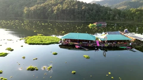 Drone flying over the lake with floating houses Video stock 259864116