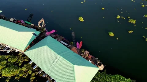 Drone flying over the lake with floating houses Video stock 259864136
