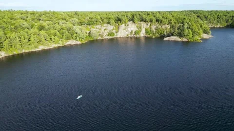 Drone Flying Over the Lake Stock Footage 248243943