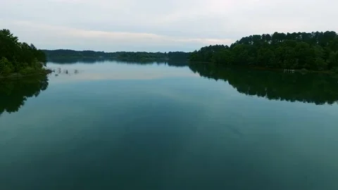 Drone Flying Over Lake With Smooth Surface1 Видео 165040487