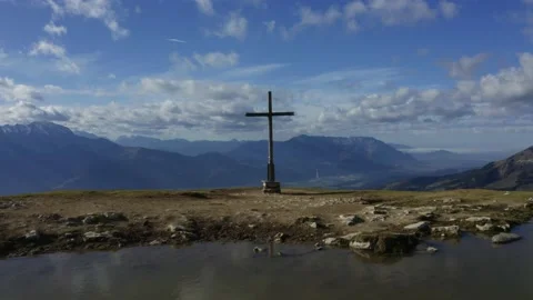 Drone flying over lake to summit cross in epic mountain scenery (Austrian Alps) Stock Footage 152305334