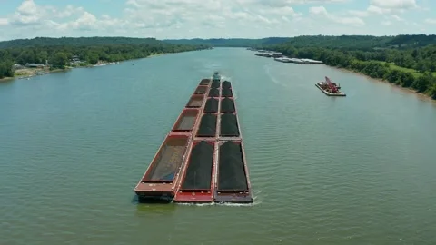 Drone flying over large coal barge on the Ohio river Stock Footage 135691959