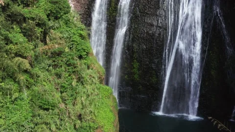 Drone flying over a large waterfall Japan Video stock 165571112