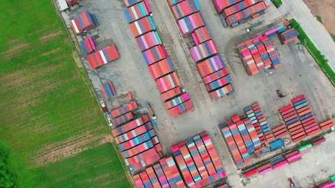 Drone is flying over a logistics park, containers for shipping with semi-trailer Stock Footage 210788366