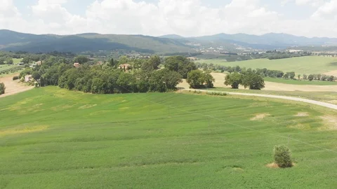 Drone flying over lush and green countryside in Umbria,Italy Stock Footage 99086680