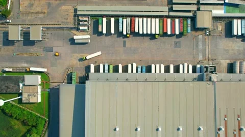 Drone flying over a many cargo containers and Semi-trailer trucks Stock Footage 225392891