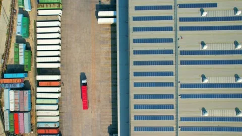Drone flying over a many cargo containers and Semi-trailer trucks Stock Footage 225393126