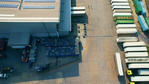Drone flying over a many cargo containers and Semi-trailer trucks Stock Footage 225393579
