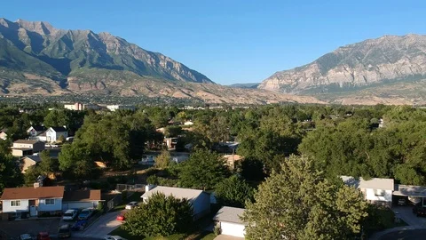 Drone flying over mountain suburbs in provo utah Stock Footage 91077115