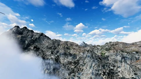 Drone flying over mountain trough clouds Stock Footage 194834573