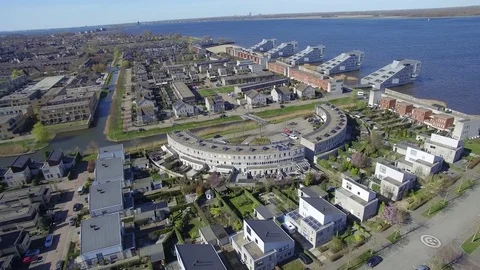 Drone flying over new build modern district in Huizen Noord-h Stock Footage 75351775