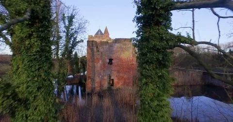 Drone flying over an old castle 動画素材 77599889