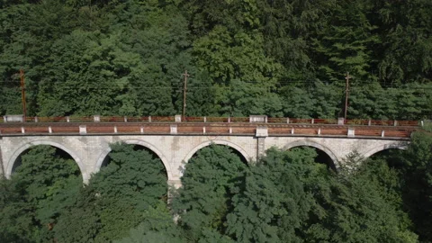 A drone flying over old train rails Video stock 229804581