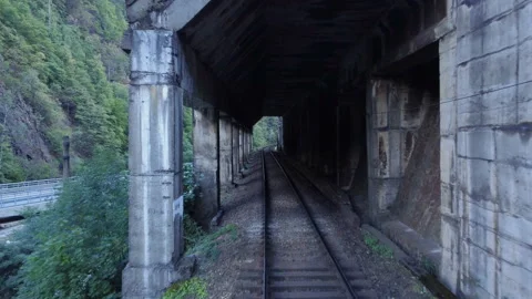 A drone flying over old train rails Video stock 229805014