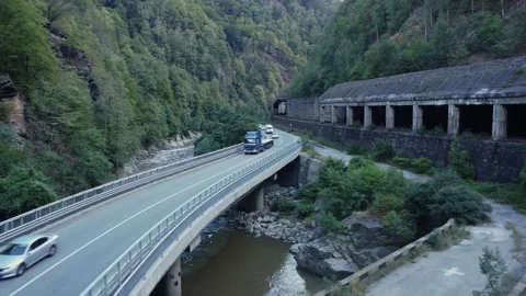 A drone flying over old train rails Video stock 229805105