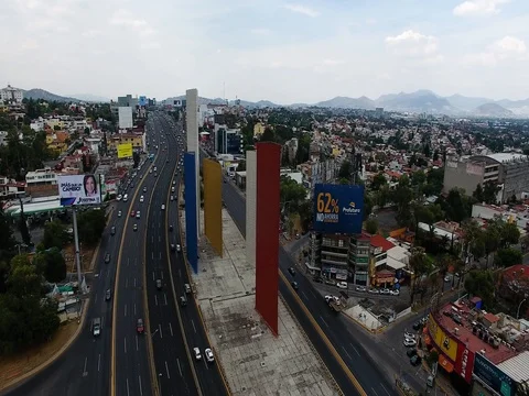 Drone flying over periferico Torres de Satelite Mexico City Vidéo 74628245