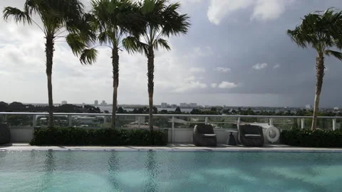 Drone Flying Over Pool Area in a hotel Stock Footage 248612540