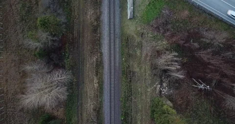 Drone flying over a railway bridge overhead 스톡 동영상 164599152