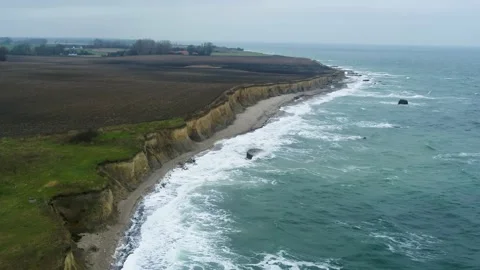 Drone flying over raw landscape, and a WWII bunker in Denmark, drone stock Stock Footage 138696788
